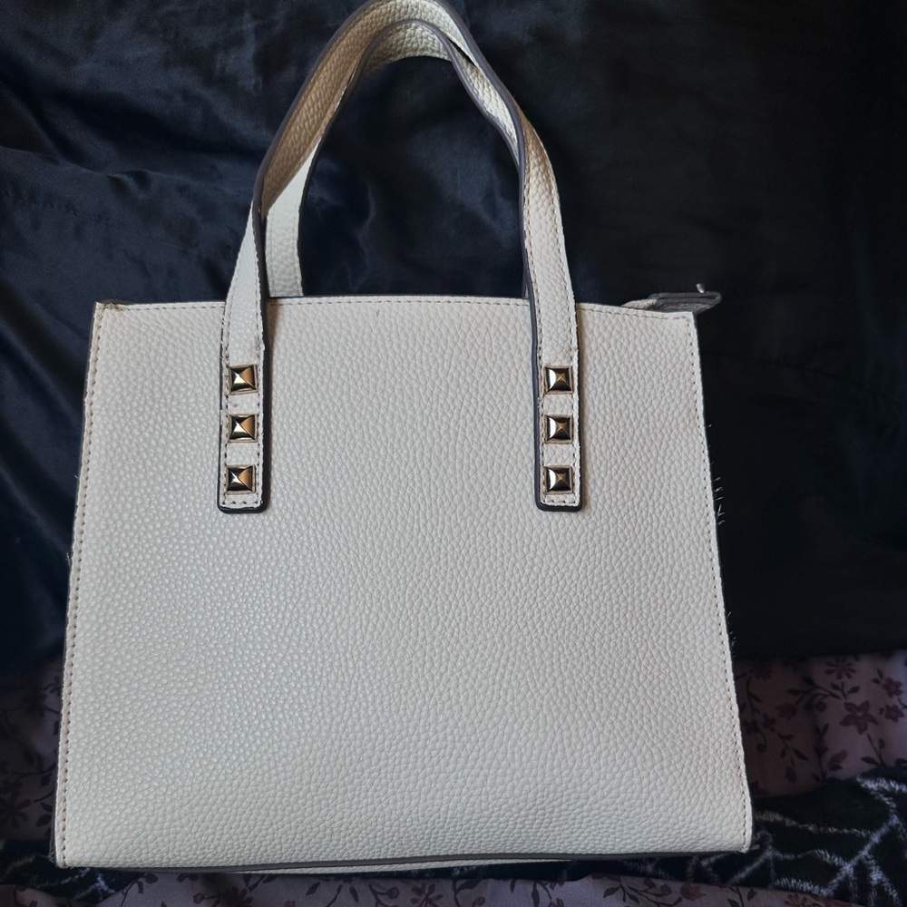 Carlos Santana purse